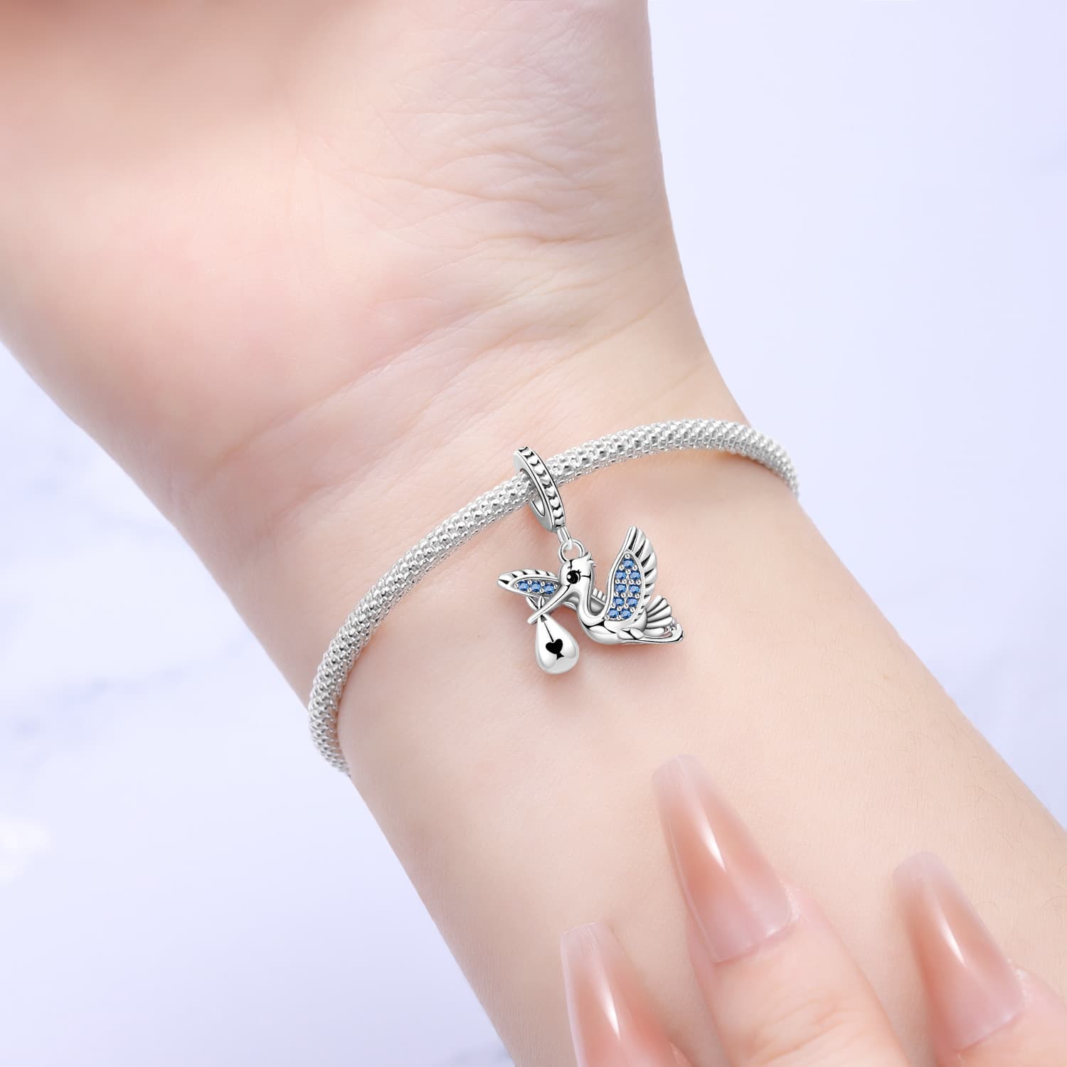 Stork charm, detail image 2