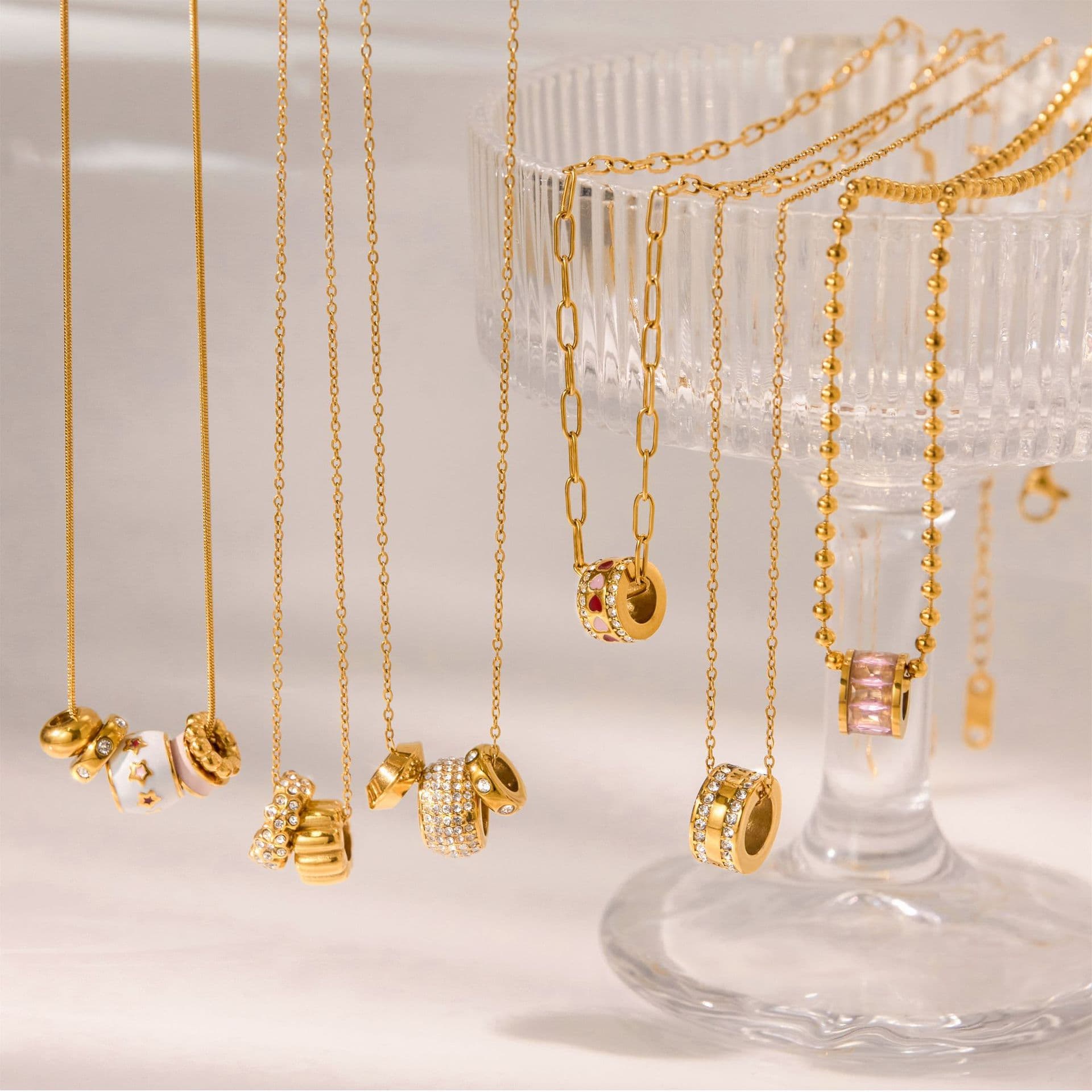 Elegant 18K gold-plated stainless steel pendant necklace with rhinestone-encrusted circle design., detail image 2