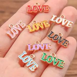 Love-themed charm bracelet idea with heart charms