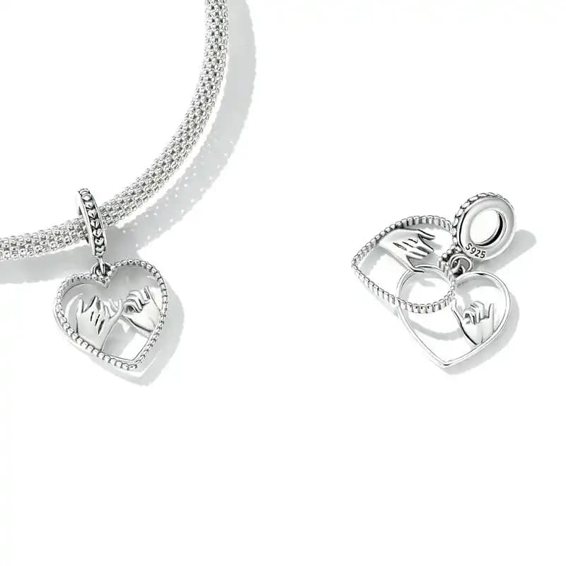 Hand-in-hand hollowed-out charm, detail image 2
