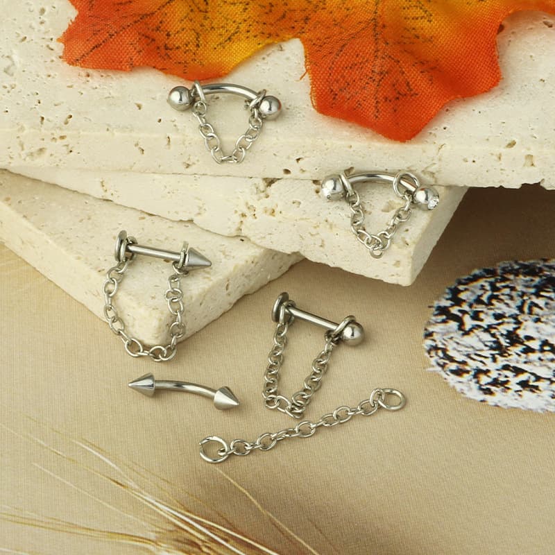 Stainless steel lip piercing chain with round ball and pointed cone ends., detail image 2