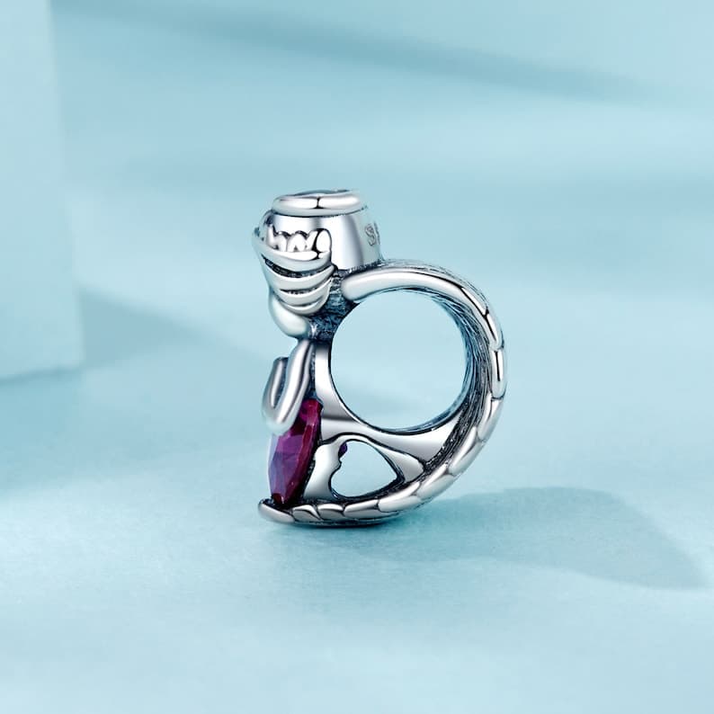 Red zircon charm angel, detail image 2